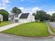 Corner lot home with a two-car garage and well maintained lawn at 2833 Golden Club Bnd, Austell, GA 30106