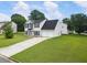 Traditional two-story home on a well maintained large lawn and long driveway at 2833 Golden Club Bnd, Austell, GA 30106
