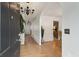 Inviting foyer with hardwood floors and an open view into the dining area at 2833 Golden Club Bnd, Austell, GA 30106