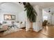 Bright and open living room with white walls, hardwood floors, and inviting white sofas with comfortable seating at 2833 Golden Club Bnd, Austell, GA 30106