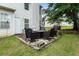 Cozy patio area featuring an outdoor dining set, perfect for entertaining guests or relaxing outdoors at 2833 Golden Club Bnd, Austell, GA 30106