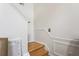 Bright staircase with white walls and wood steps leading to the upper level at 2833 Golden Club Bnd, Austell, GA 30106