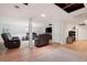 Finished basement boasts a seating area with leather furniture for relaxing or watching TV at 4920 Hampton Lake Dr, Marietta, GA 30068