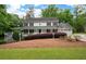 Charming two-story home with a welcoming front porch and meticulously landscaped front yard at 4920 Hampton Lake Dr, Marietta, GA 30068