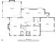 First floor plan featuring a kitchen, living room, dining area, and garage at 4920 Hampton Lake Dr, Marietta, GA 30068