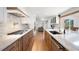 Modern kitchen featuring marble countertops, stainless steel appliances, and an expansive island at 4920 Hampton Lake Dr, Marietta, GA 30068