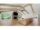 Spacious living room features vaulted ceilings, wood beams and a stone fireplace at 4920 Hampton Lake Dr, Marietta, GA 30068
