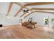 Expansive living room with wood floors, wood beam ceilings, and comfortable seating at 4920 Hampton Lake Dr, Marietta, GA 30068