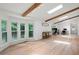 Large office space featuring lots of natural light from several windows and hardwood floors at 4920 Hampton Lake Dr, Marietta, GA 30068