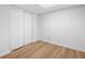 This room has wood floors, white bead board walls, and a closet with sliding doors at 4920 Hampton Lake Dr, Marietta, GA 30068