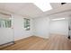 This room has wood floors, white bead board walls, a window and a door to the backyard at 4920 Hampton Lake Dr, Marietta, GA 30068