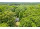 Aerial view of home surrounded by beautiful green trees at 4985 Watkins Ct, Winston, GA 30187