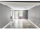 Spacious basement featuring tile flooring, a window, and a glass door at 4985 Watkins Ct, Winston, GA 30187