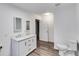 Updated bathroom with double vanity, drawers for storage, and a toilet at 4985 Watkins Ct, Winston, GA 30187