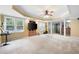 Spacious basement area featuring plush carpeting, recessed lighting, and a built-in entertainment center for relaxation and enjoyment at 206 Kingsley Way, Woodstock, GA 30188