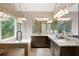 Spacious bathroom with granite counter tops, dual sinks, glass shower and lots of natural light at 206 Kingsley Way, Woodstock, GA 30188