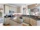 Open kitchen featuring granite countertops, center island, stainless appliances, and ample cabinet space at 206 Kingsley Way, Woodstock, GA 30188