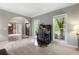 Sunlit home office with hardwood floors, a large desk and views of the backyard at 206 Kingsley Way, Woodstock, GA 30188