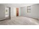 Bedroom with carpeted floors and natural light from a window at 2519 Lauderdale Ne Dr, Atlanta, GA 30345