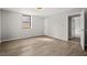 Bedroom with a window, closet, and door at 2519 Lauderdale Ne Dr, Atlanta, GA 30345
