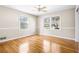 This bedroom has hardwood floors, natural light, and neutral colors at 2519 Lauderdale Ne Dr, Atlanta, GA 30345