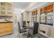 Breakfast nook features gray slate tile flooring, large windows, and modern furniture at 2519 Lauderdale Ne Dr, Atlanta, GA 30345