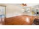 Open living space with hardwood floors flows into an eat-in kitchen with stainless appliances and modern cabinets at 2519 Lauderdale Ne Dr, Atlanta, GA 30345