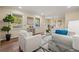Bright living room with hardwood floors, two front windows, and a doorway to the dining room at 2519 Lauderdale Ne Dr, Atlanta, GA 30345