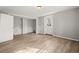 Utility room with laminate flooring and door to outside at 2519 Lauderdale Ne Dr, Atlanta, GA 30345