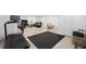 Finished basement with exercise equipment, a TV, a leather couch, a basket, and carpet floors at 2885 Laurel Green Ct, Roswell, GA 30076