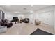 Finished basement with recessed lighting, plank walls, and comfortable seating at 2885 Laurel Green Ct, Roswell, GA 30076
