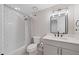 Updated bathroom with subway tile, modern fixtures, and vanity with storage at 2885 Laurel Green Ct, Roswell, GA 30076