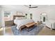 Inviting main bedroom featuring a serene color scheme, large windows, and stylish, hardwood flooring at 2885 Laurel Green Ct, Roswell, GA 30076