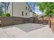 Large driveway with three-car garage and basketball hoop at 2885 Laurel Green Ct, Roswell, GA 30076