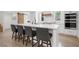 Modern kitchen with a spacious island, stainless steel appliances, and bar stool seating at 2885 Laurel Green Ct, Roswell, GA 30076