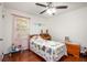 Bright bedroom with hardwood floors and a whimsical charm, perfect for children or guests at 3852 Drew Campground Rd, Cumming, GA 30040