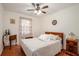 Cozy bedroom features a ceiling fan and classic furnishings, creating a relaxing space at 3852 Drew Campground Rd, Cumming, GA 30040