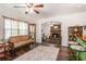 Cozy living room features hardwood floors, vintage decor, and inviting fireplace at 3852 Drew Campground Rd, Cumming, GA 30040