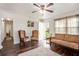 Inviting living room with hardwood floors, comfortable seating, and bright natural light at 3852 Drew Campground Rd, Cumming, GA 30040