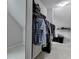 Walk-in closet provides ample storage space with racks and shelves for organization at 5770 Bridleton Xing, Suwanee, GA 30024