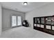 Office area with balcony access, providing natural light and fresh air at 5770 Bridleton Xing, Suwanee, GA 30024
