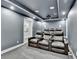 Home theater featuring luxury leather recliners, custom lighting, and an overhead projector at 5770 Bridleton Xing, Suwanee, GA 30024