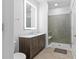 Bathroom featuring a modern vanity and tiled shower with a glass door at 775 Juniper Ne St # 210, Atlanta, GA 30308