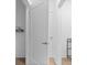 Bright closet with white trim and hardware, as well as wood flooring, offers simple storage solutions at 775 Juniper Ne St # 210, Atlanta, GA 30308