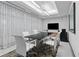 Professional conference room with modern furnishings and a large screen for presentations at 775 Juniper Ne St # 210, Atlanta, GA 30308