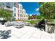 Elegant courtyard featuring comfortable seating and a well-manicured lawn, perfect for outdoor entertaining and relaxation at 775 Juniper Ne St # 210, Atlanta, GA 30308