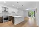 Bright, eat-in kitchen features stainless steel appliances and hardwood floors at 775 Juniper Ne St # 210, Atlanta, GA 30308