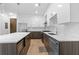 Modern kitchen featuring stainless-steel appliances and a large island at 775 Juniper Ne St # 210, Atlanta, GA 30308