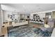 Spacious resident lounge area with stylish furniture, a fireplace, and a convenient bar area at 775 Juniper Ne St # 210, Atlanta, GA 30308
