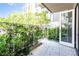 Cozy balcony with a lush green view, providing a tranquil outdoor space to relax and enjoy the surroundings at 775 Juniper Ne St # 210, Atlanta, GA 30308